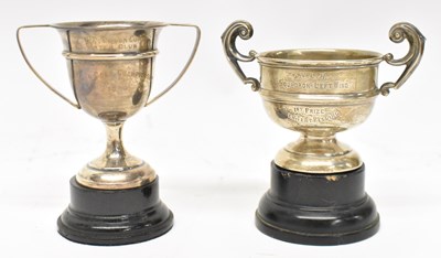 Lot 1200 - A George V hallmarked silver twin handled...