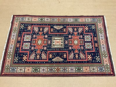 Lot 699 - A Persian rug with geometric pattern, 158 x...