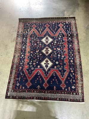 Lot 694 - A Persian Afshar rug with three central ivory...