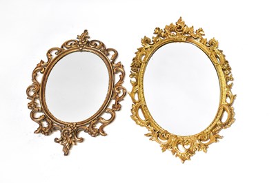 Lot 96 - A Rococo-style gilt framed oval wall mirror,...