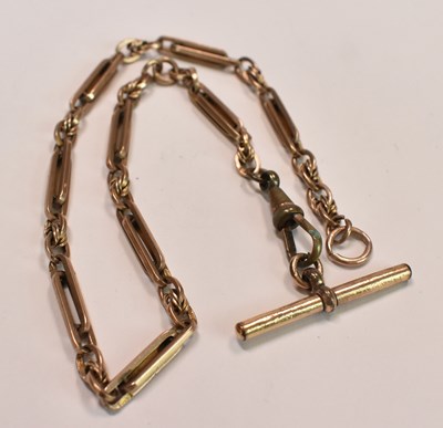 Lot 583 - A 9ct yellow gold trombone link watch chain,...