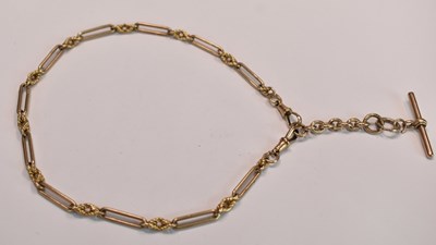 Lot 581 - A 9ct yellow gold trombone link fob chain,...