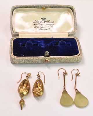 Lot 642 - A pair of Victorian yellow metal drop earrings,...