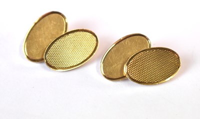 Lot 589 - A pair of 9ct yellow gold cufflinks with...