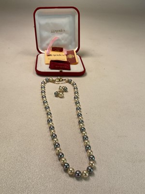 Lot 634 - MAJORICA PEARLS; a cultured pearl two tone...