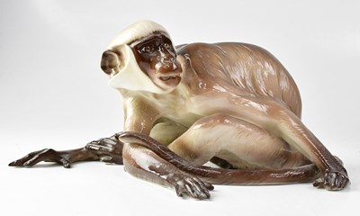 Lot 257 - NYMPHENBURG; a 20th century model of a monkey...
