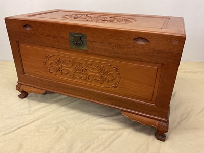 Lot 752 - A carved Chinese camphor blanket box, height...