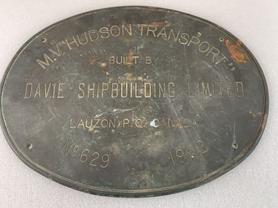 Lot 33 - An oval metal plaque inscribed 'M.V. Hudson...