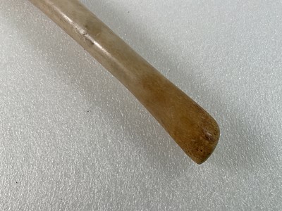 Lot 41 - An oosik (fossilised walrus penis), often used...