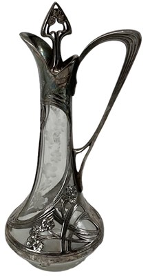 Lot 663 - WMF; an Art Nouveau silver plated and pewter...