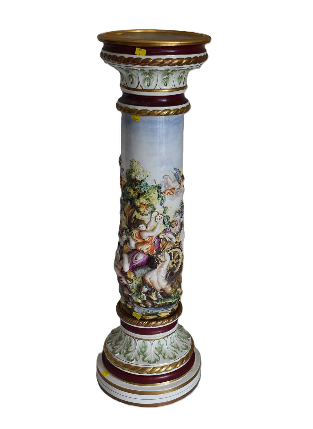 Lot 63 - CAPODIMONTE; a large embossed decorated...