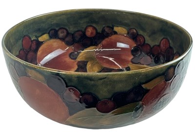 Lot 632 - MOORCROFT; a large fruit bowl in the...