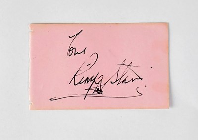 Lot 262 - PAUL MCCARTNEY; a torn page from an autograph...