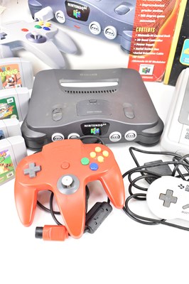 Lot 684 - NINTENDO; a boxed Nintendo 64, a Super...