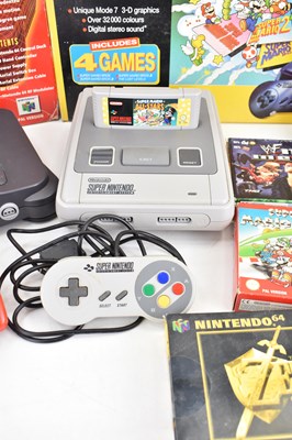 Lot 684 - NINTENDO; a boxed Nintendo 64, a Super...