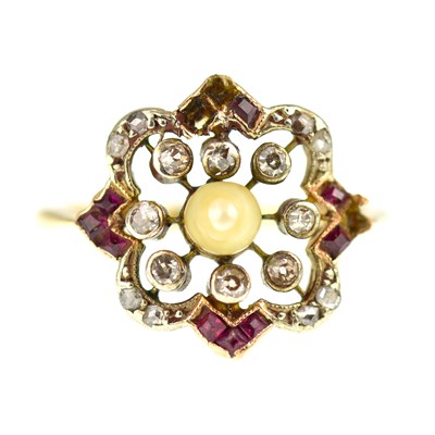 Lot 1032 - A yellow gold diamond ring set with central...