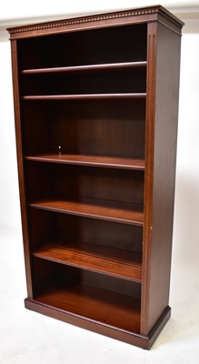 Lot 18 - A mahogany freestanding open bookcase, with...