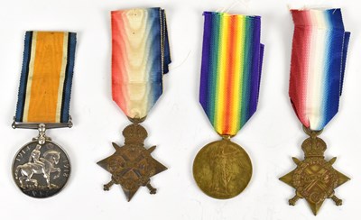 Lot 413 - A collection of four WWI medals comprising a...