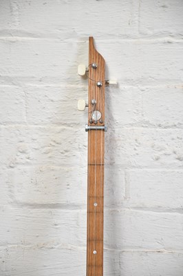 Lot 1584 - A scratch built three string cigar box guitar.