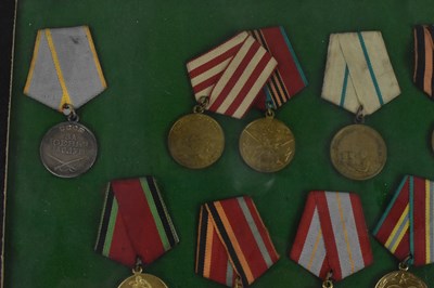 Lot 406 - A collection of Russian medals and orders to...