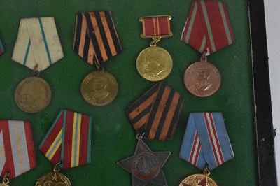 Lot 406 - A collection of Russian medals and orders to...