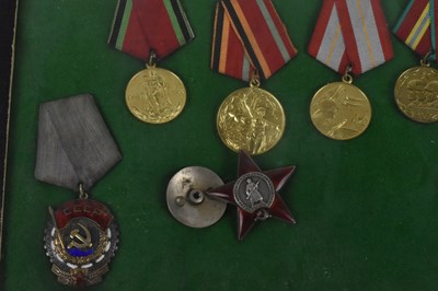 Lot 406 - A collection of Russian medals and orders to...