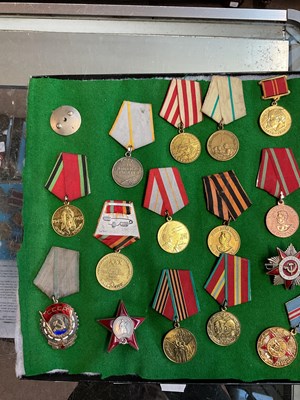 Lot 406 - A collection of Russian medals and orders to...