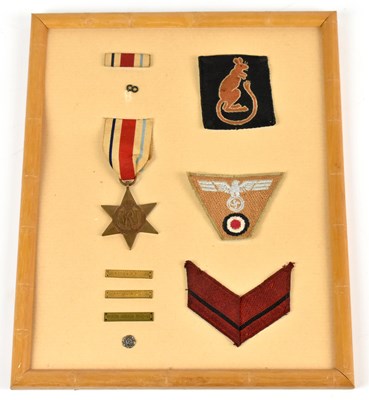 Lot 379 - A framed and mounted medal and insignia...