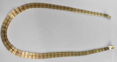 Lot 1242 - A 9ct tricolour gold necklace, length 42cm,...