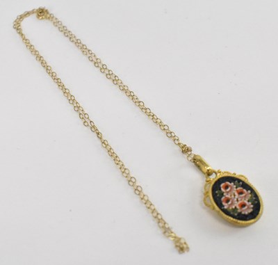 Lot 1306 - A yellow metal mounted micromosaic pendant on...