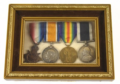 Lot 371 - A WWI naval medal group of four awarded to...