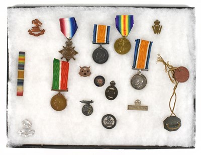 Lot 410 - A group of WWI and later medals, badges and...