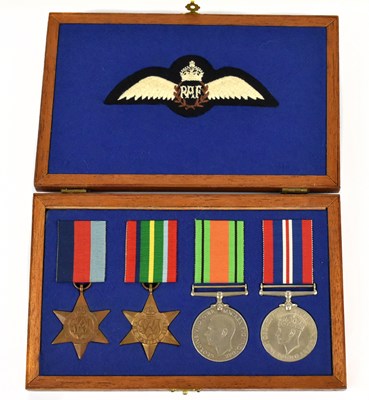 Lot 382 - A cased set of four WWII medals comprising...