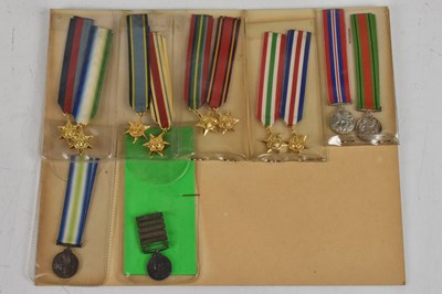 Lot 409 - A collection of forty-five miniature medals to...