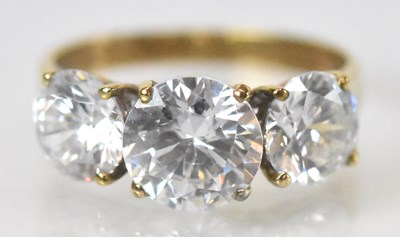 Lot 1375 - A 9ct yellow gold ring set with three large...