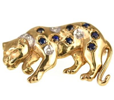 Lot 1063 - A 9ct gold brooch in the form of a panther set...