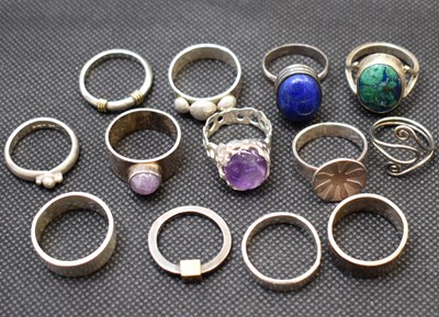 Lot 1034 - Thirteen various silver and silver-coloured...