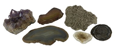 Lot 364 - A group of six rock crystal and fossil...