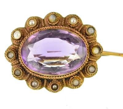 Lot 1059 - A Victorian 9ct gold brooch with oval cut...