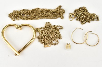 Lot 1080 - A 9ct gold open heart-shaped pendant on a 9ct...
