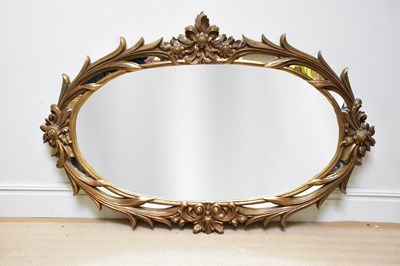 Lot 1040 - A large modern gilt framed wall mirror, 120cm...