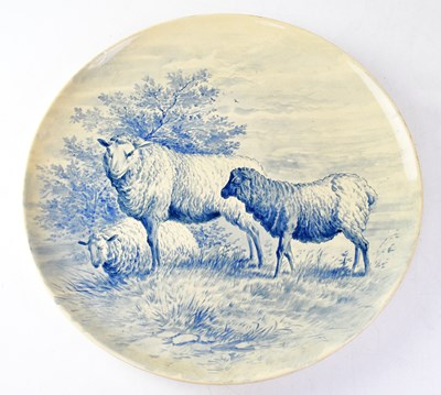 Lot 285 - MINTON; a circular plaque painted in blue and...
