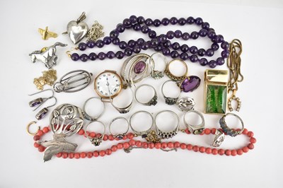 Lot 1128 - Costume jewellery comprising a 9ct gold dress...