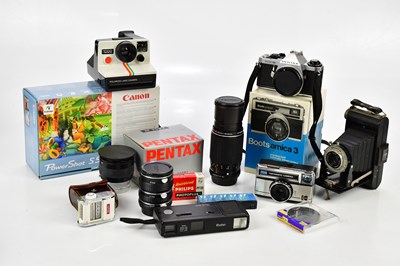 Lot 510 - A collection of cameras, to include a Pentax...