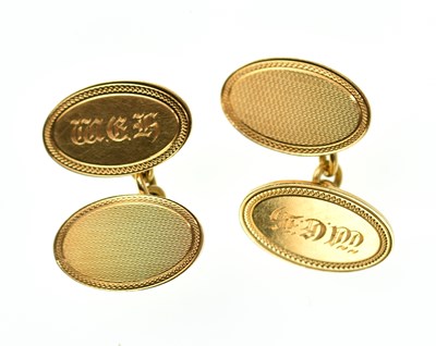 Lot 1108 - A pair of 18ct gold oval cufflinks with...