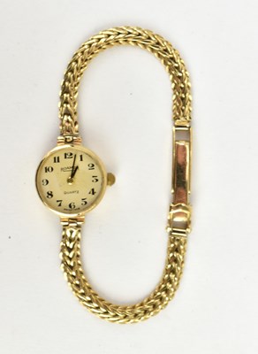 Lot 1205 - ROAMER; a ladies' 9ct gold watch, the white...
