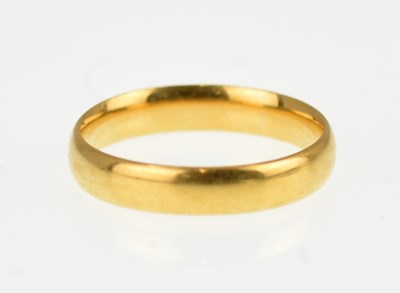 Lot 988 - A 22ct gold wedding band, size K, approx. 3.3g.