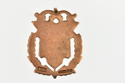 Lot 1113 - A 9ct gold prize fob, blank back with rubbed...