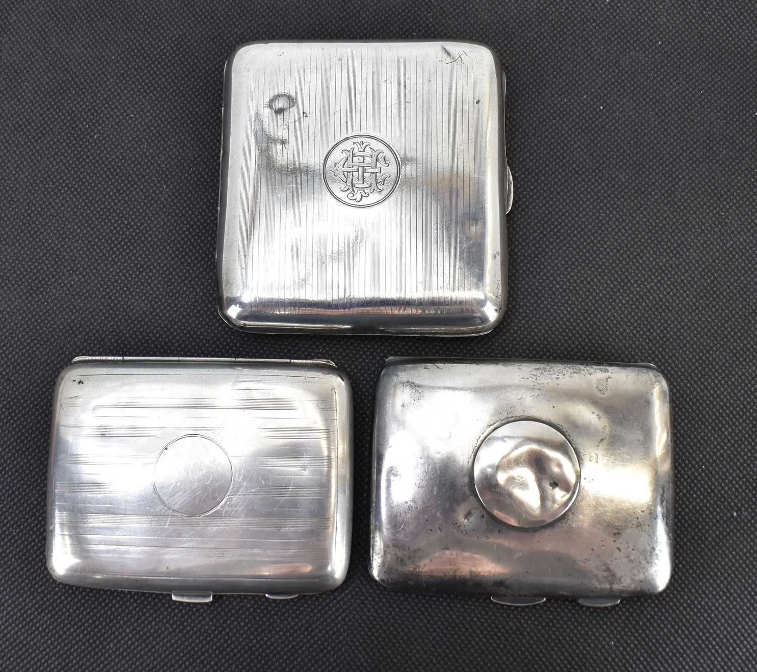 Lot 944 - Three hallmarked silver cigarette cases, all...