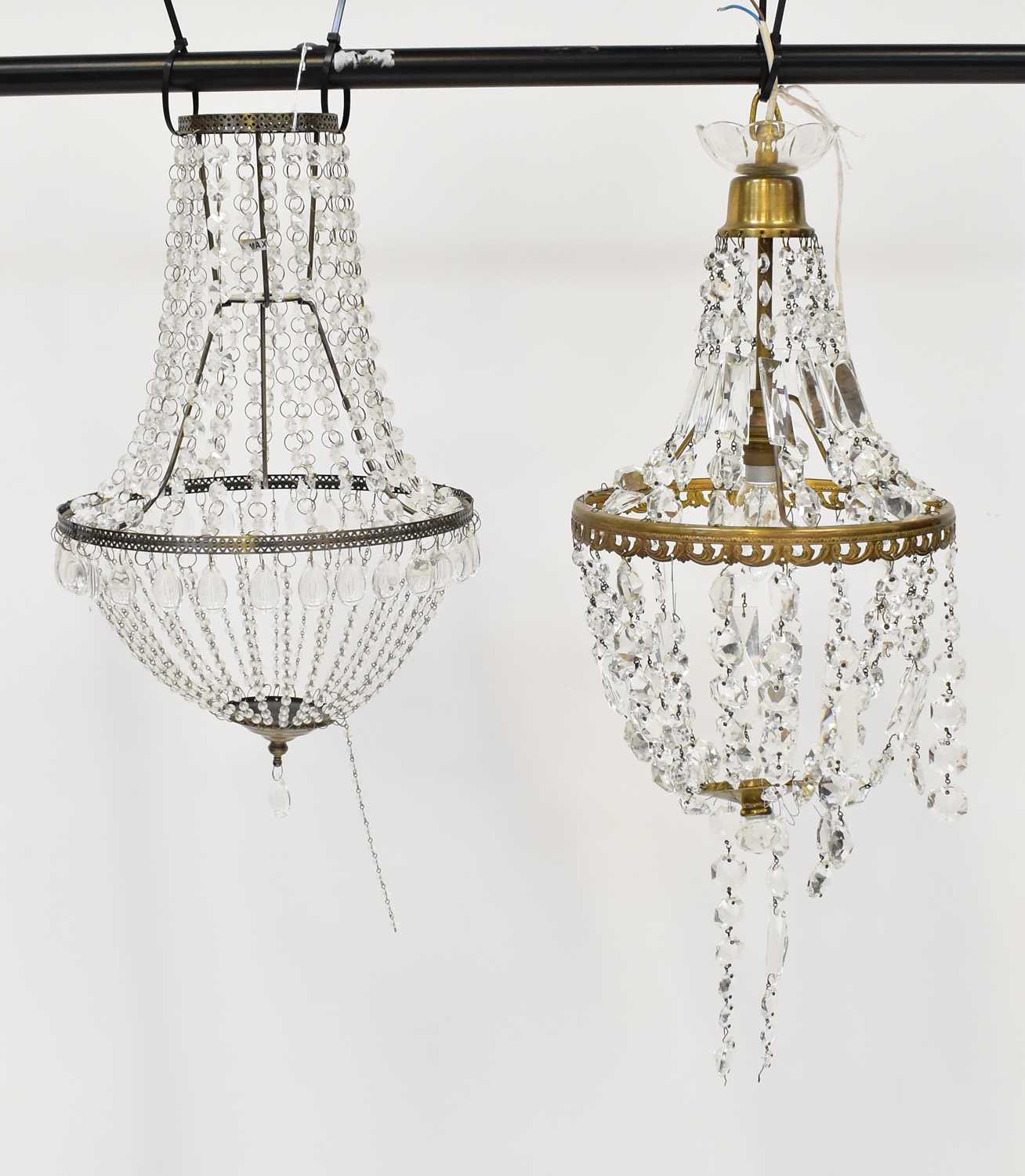 Lot 89 - Two modern small chandeliers, heights approx....